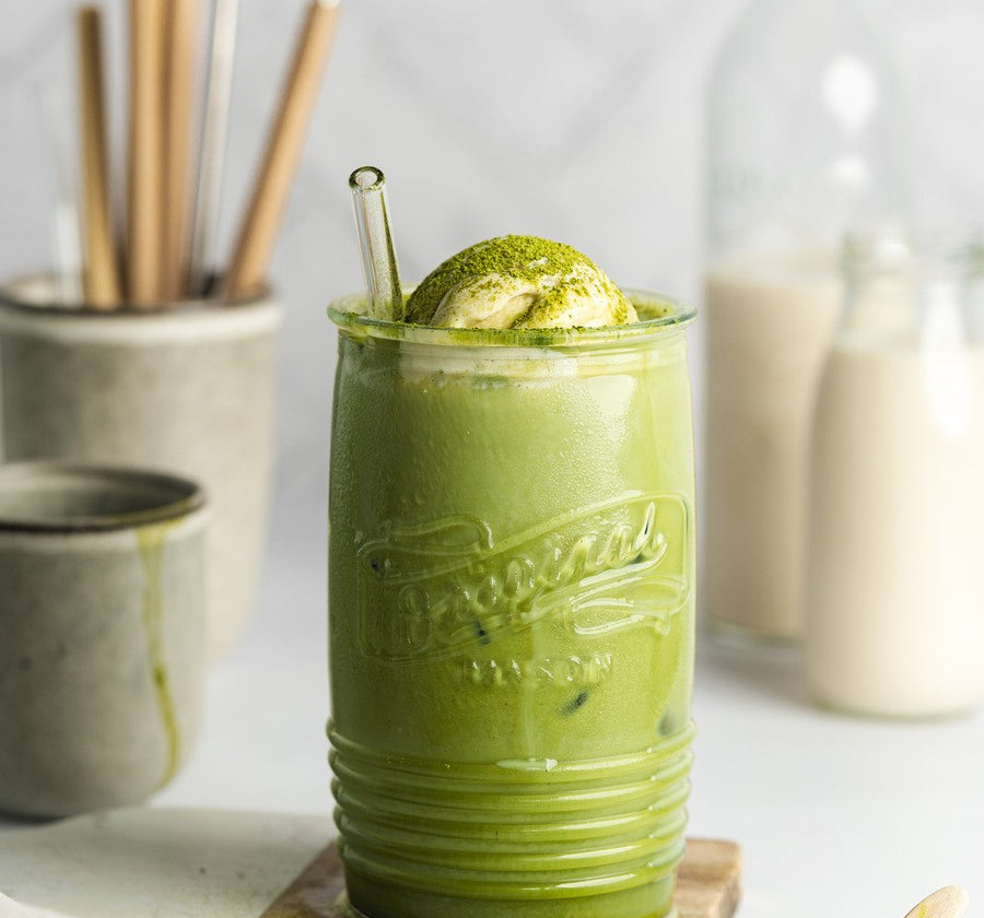 Whisked organic matcha tea in a cup – natural energy boost and focus-enhancing superfood.