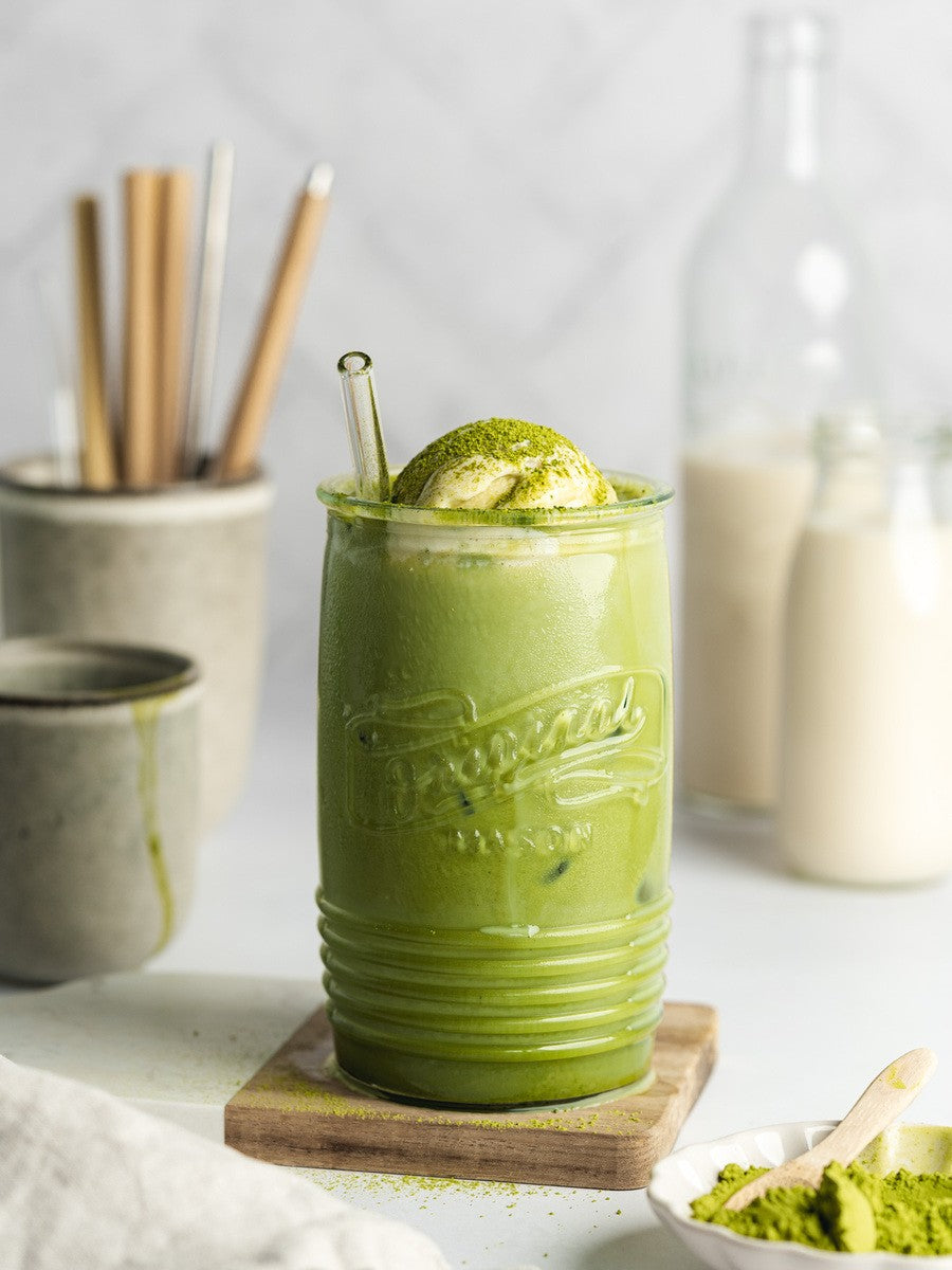 Whisked organic matcha tea in a cup – natural energy boost and focus-enhancing superfood.
